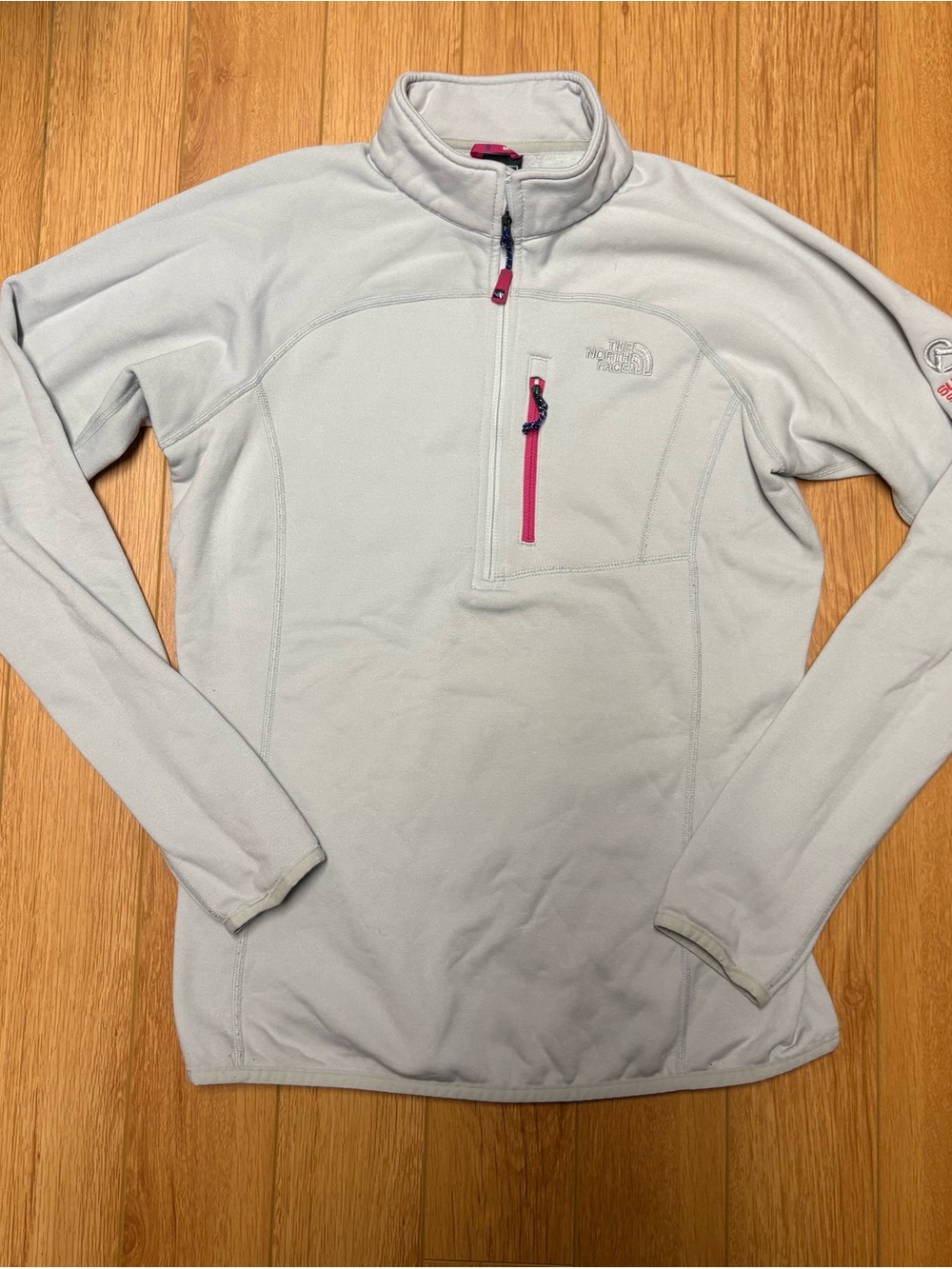 The North Face Women’s Light Gray Quarter-Zip Fleece with Pink Zip Accent